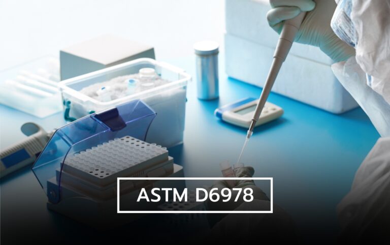 Scientist using micropipette for ASTM D6978 testing.