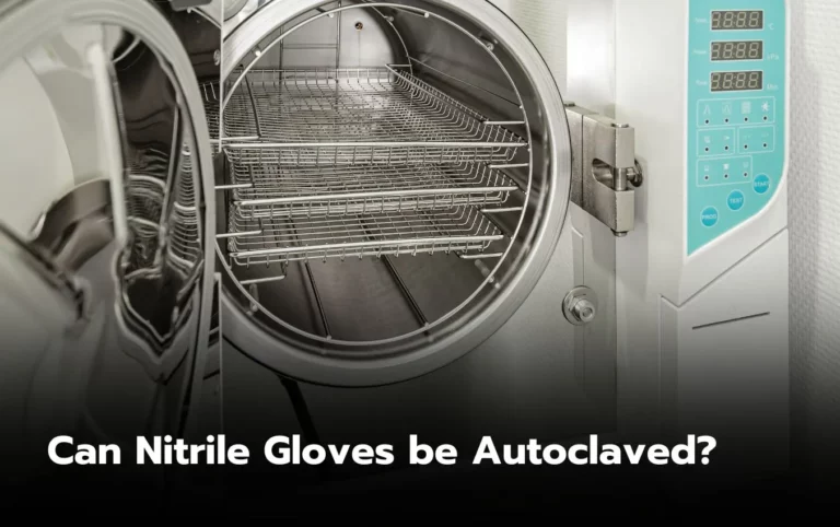 Open autoclave with empty stainless steel trays. Can nitrile gloves be autoclaved?