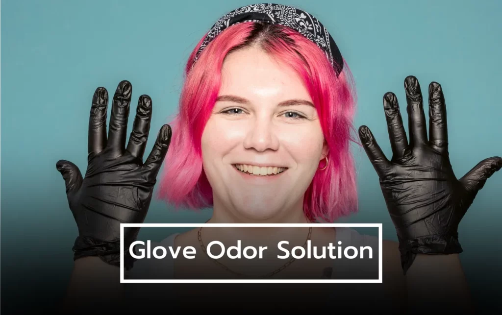Woman wearing black gloves, smiling, showcasing a glove odor solution.