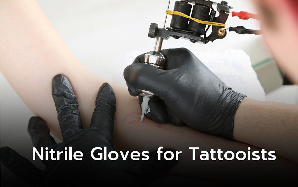 Tattoo artist's gloved hands using a tattoo machine on a client's arm. Nitrile gloves provide protection.