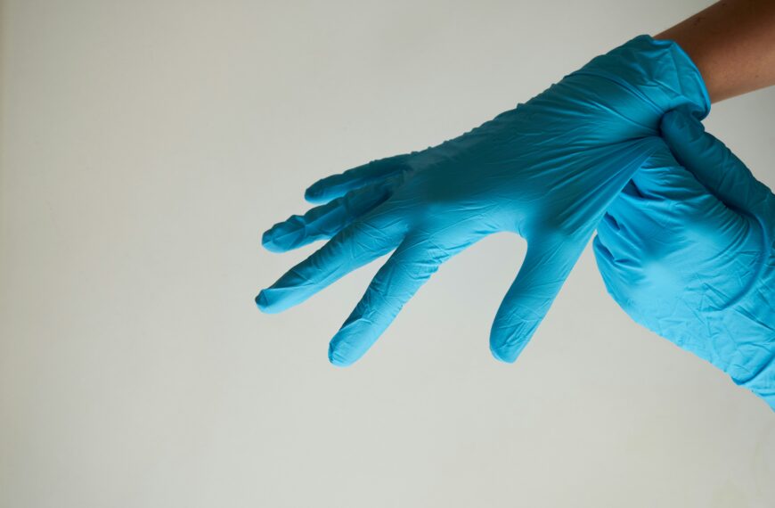 How many times stronger are disposable nitrile gloves than latex or vinyl?
